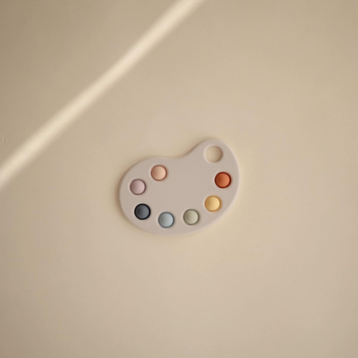mushie paint palette press toy