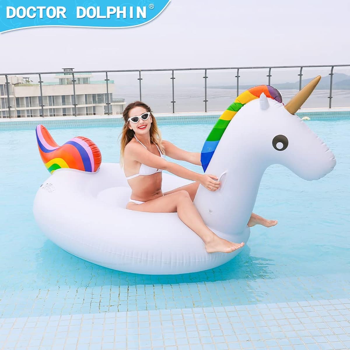 Dr. Dolphin Inflatable Giant Unicorn Pool Float for Adults & Kids - Unicorn Floatie with 2 Safety Handles - Summer Party Supplies