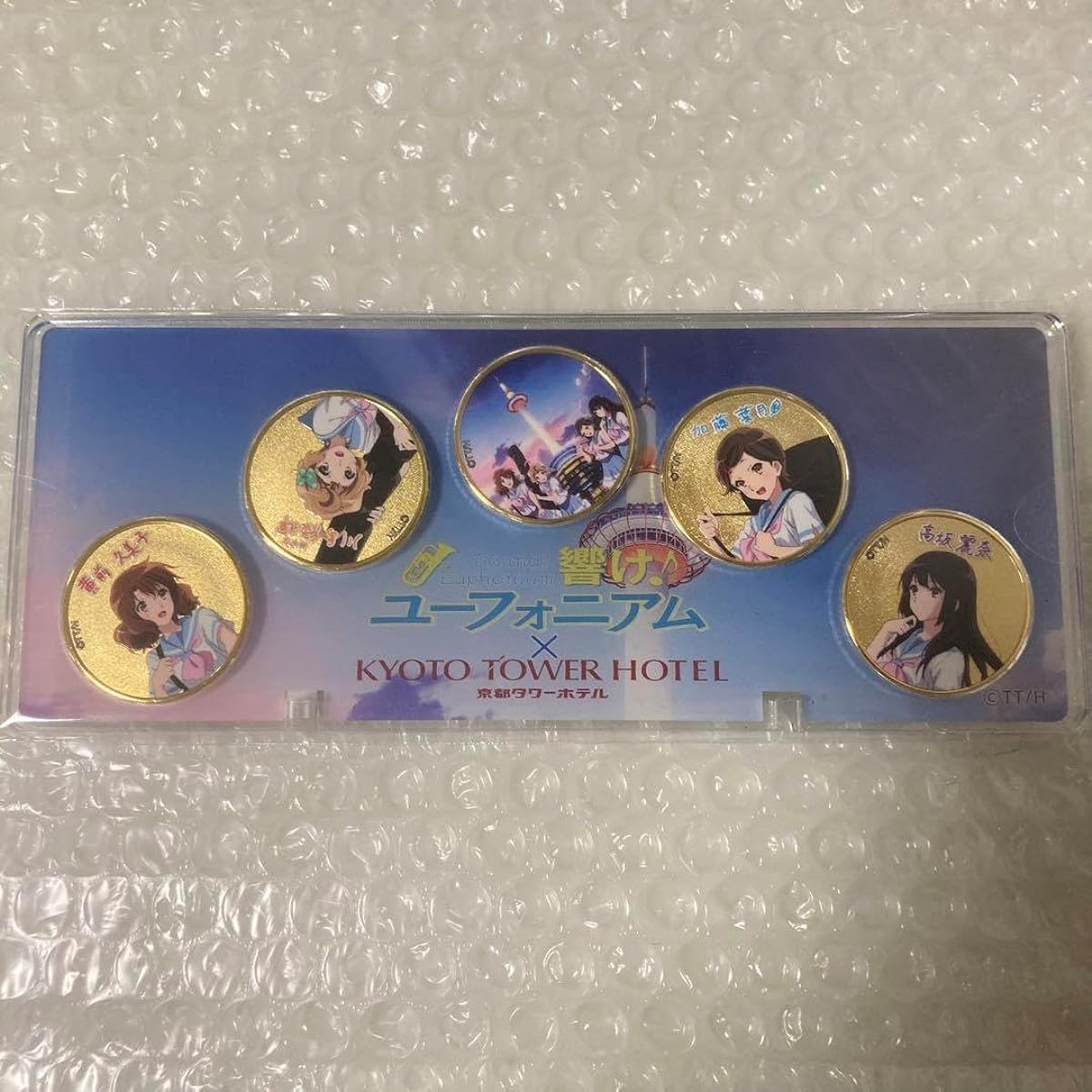 Acrylic case with a commemorative medal for Sound 4 Sound Euphonium x Keihan collaboration