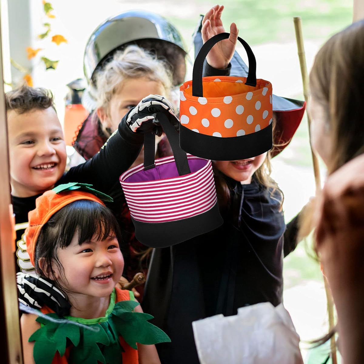 4 Pieces Halloween Trick or Treat Bags Halloween Candy Bucket Tote Bags Present Bags Orange Black Purple Candy Corn White Polka Dot Stripe Halloween Party Favor Bags Halloween Goodies 4 Styles
