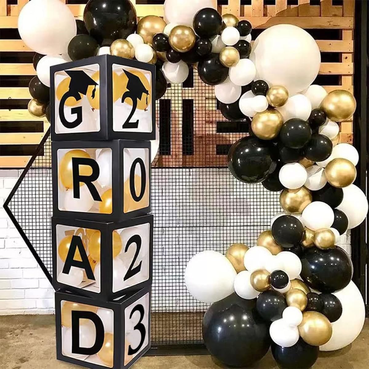 2022 Graduation Decorations Party Supplies, 4 Black Graduation Balloon Boxes with "GRAD" and "2O22" Letters and 20 Balloons, perfect for graduation party decorations.