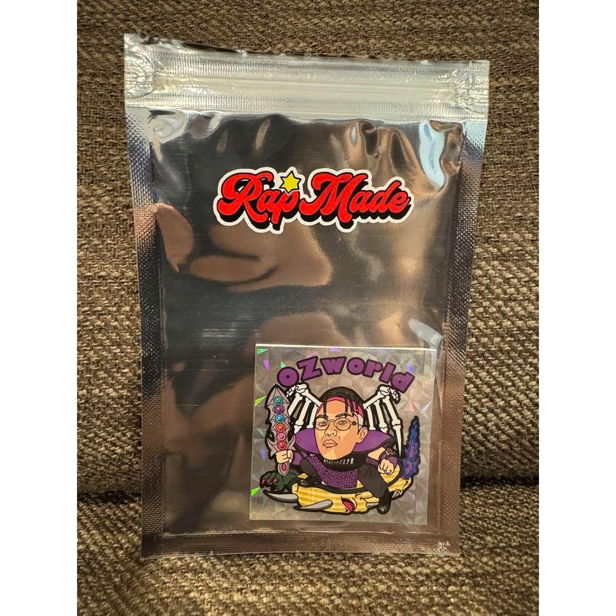OZworld Rappriman with package rapmade