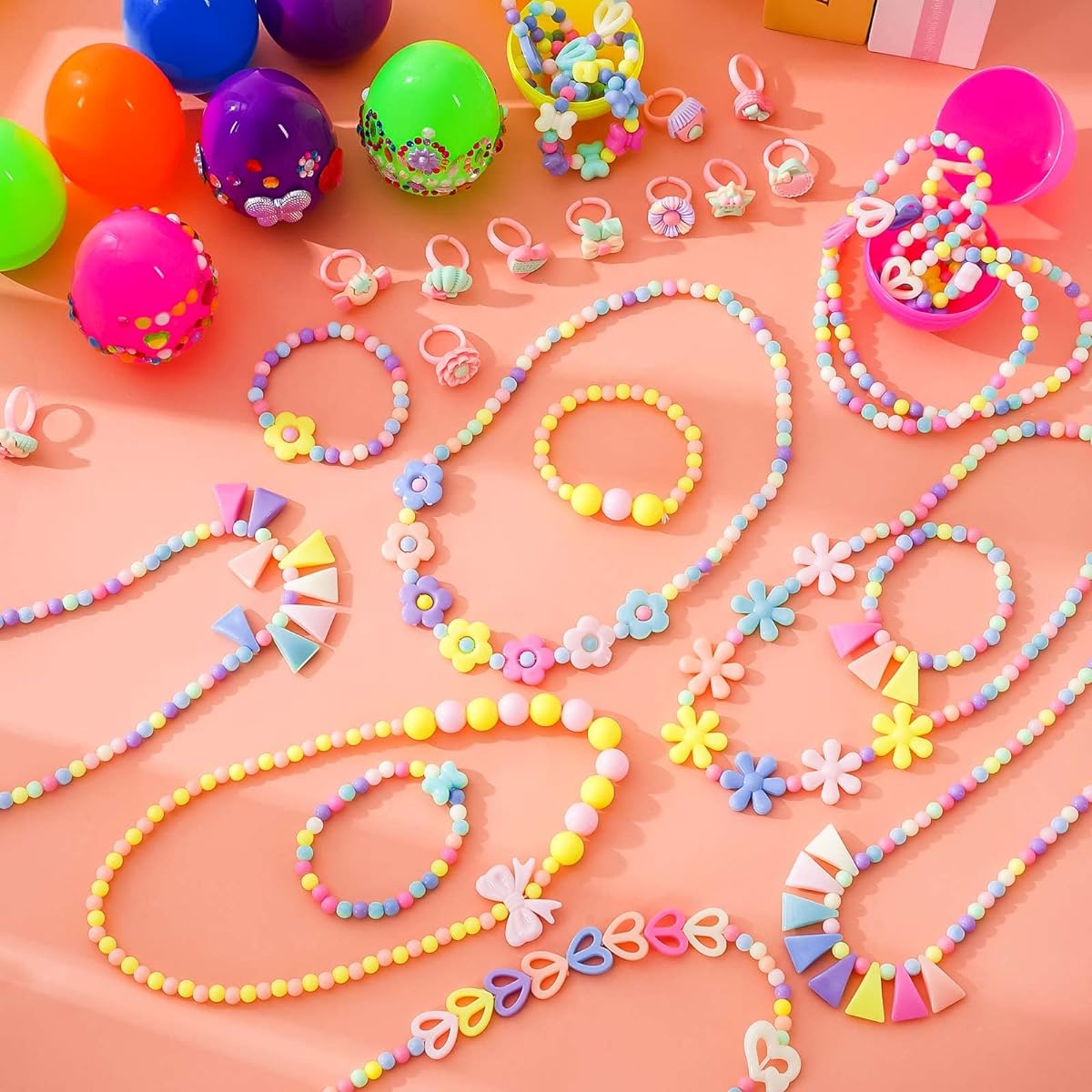 Whaline Easter Party Favors Gift Kit - Colorful Prefilled Easter Eggs Necklaces, Bracelets, Rings and Diamond Stickers for Kids, Easter Basket Stuffers, Classroom Exchange Prizes and Awards