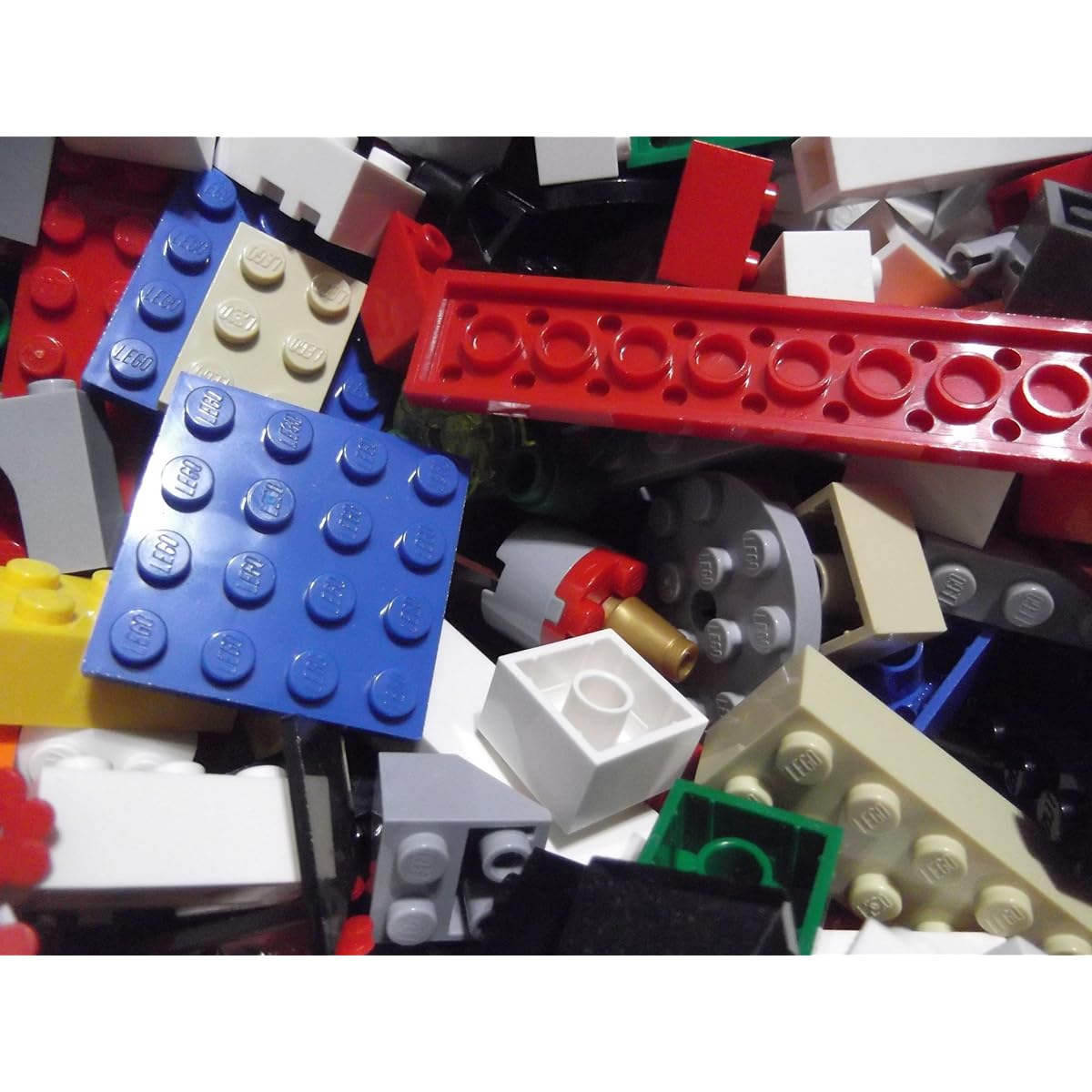 1 lb of Lego bricks, parts and pieces.