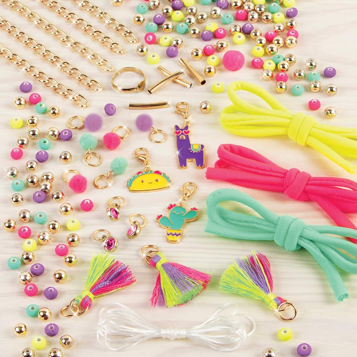 Make It Real - Neo-Brite Chains and Charms. DIY Gold Chain Charm Bracelet Making Kit for Girls. Art and craft kit to create unique tween bracelets with neon beads, unique pom pom charms and gold chains.