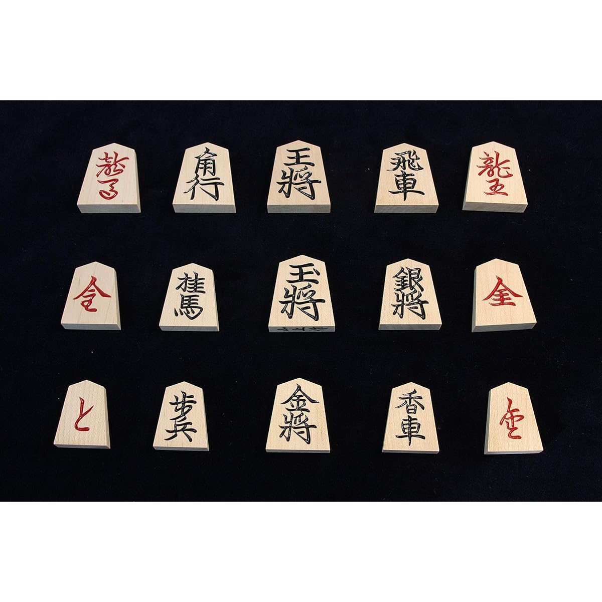 Set of shogi pieces by Yamagami, top carving, red back and 1 inch tabletop board