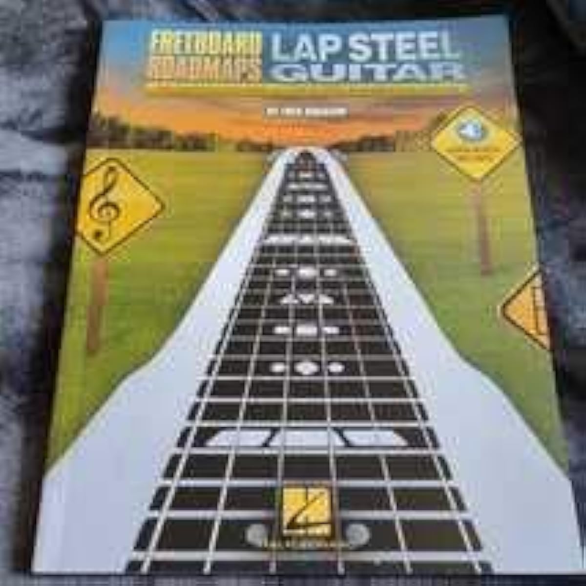 Lap steel guitar instruction book (with web sound source and TAB) Imported instruction book