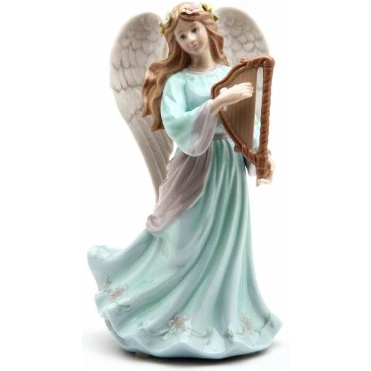 Porcelain angel figurine playing the harp with music box
