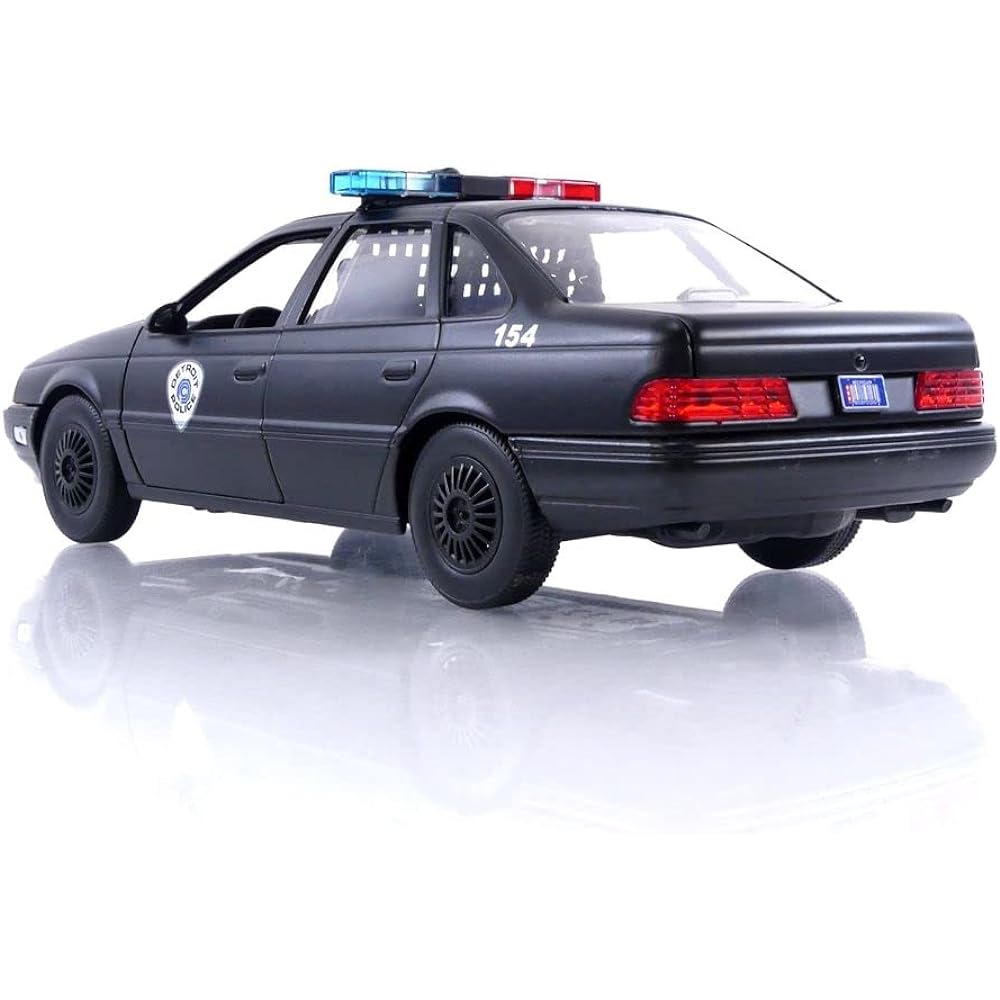 Jada Toys 1:24 ROBOCOP 1986 OCP FORD TAURUS w/ROBOCOP Robocop Minicar [Parallel Import]