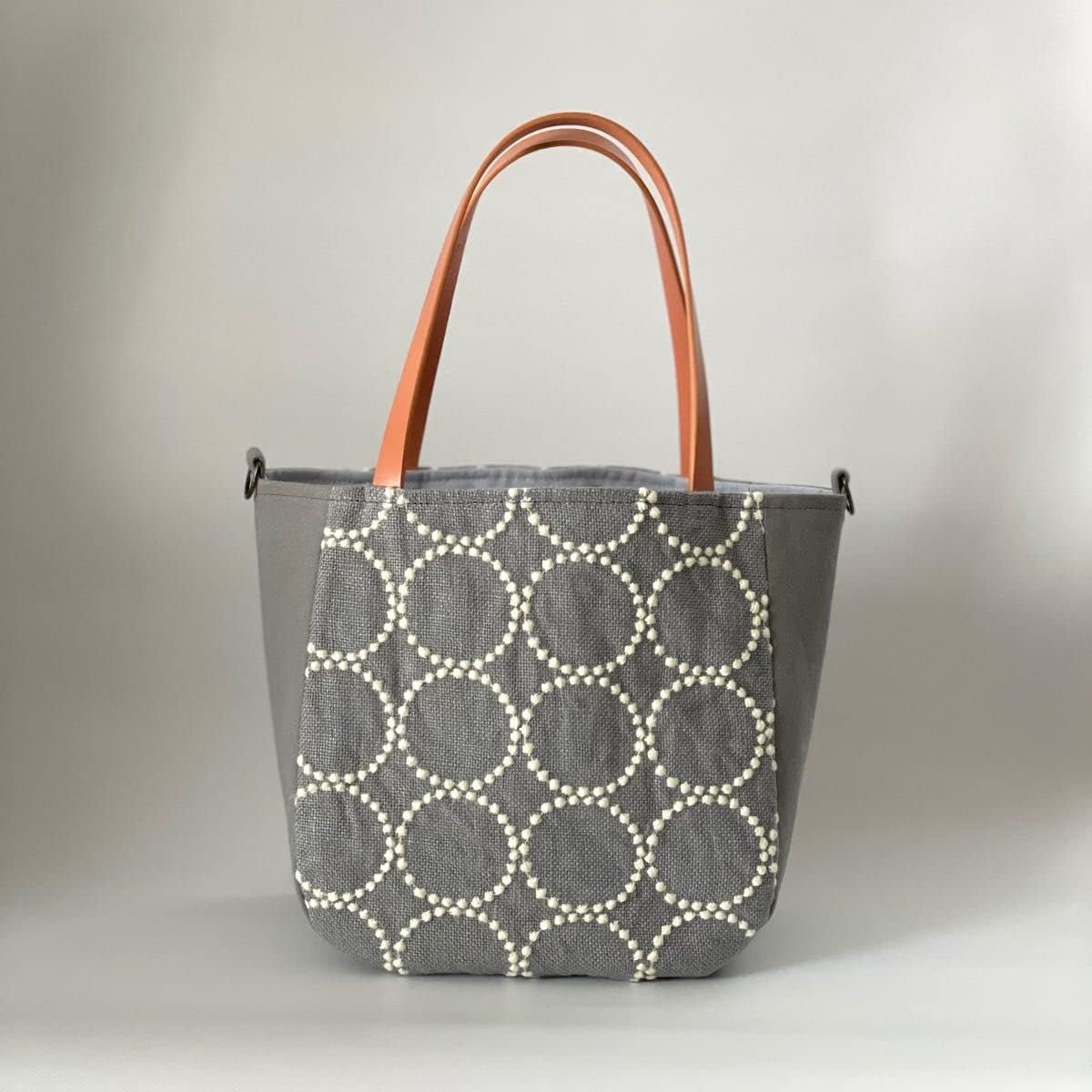 Mina Perhonen tambourine grey round tote minimal tote
