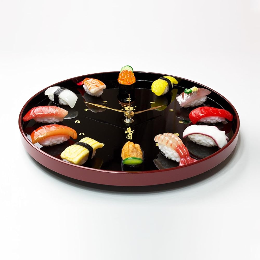 Real sushi clock that looks just like the real thing. Can be used as a wall clock or table clock. Made in Japan.