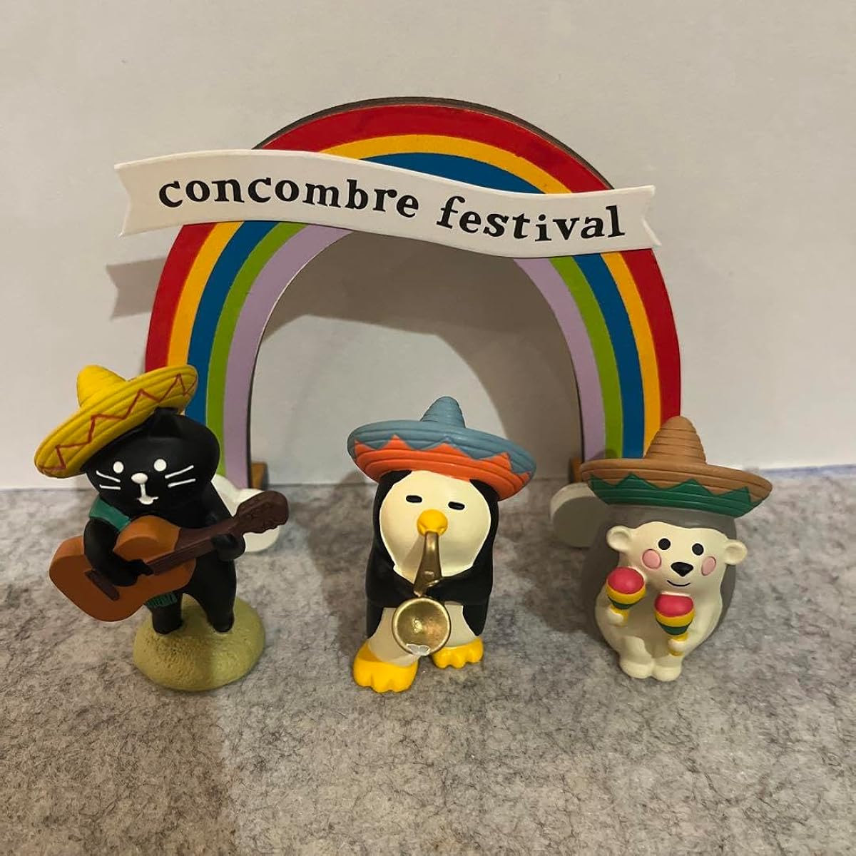 Concomble Festival Penguin Sax Maracas Hedgehog Guitar Black Cat