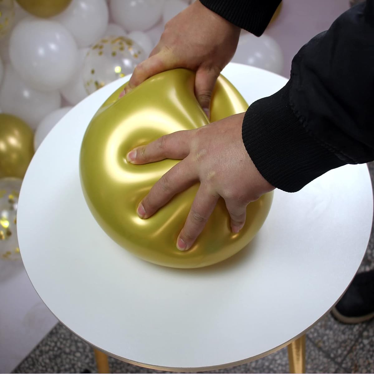 white gold balloon arch