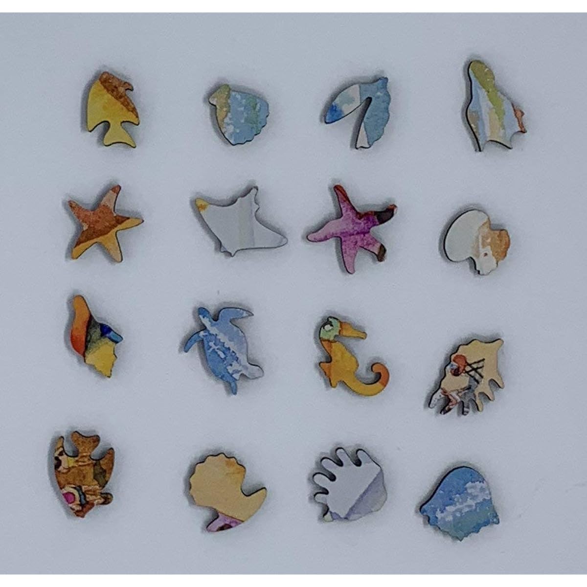 Nautilus Puzzles Wooden Jigsaw Puzzle A Day at the Beach 145 Piece Made in the USA.