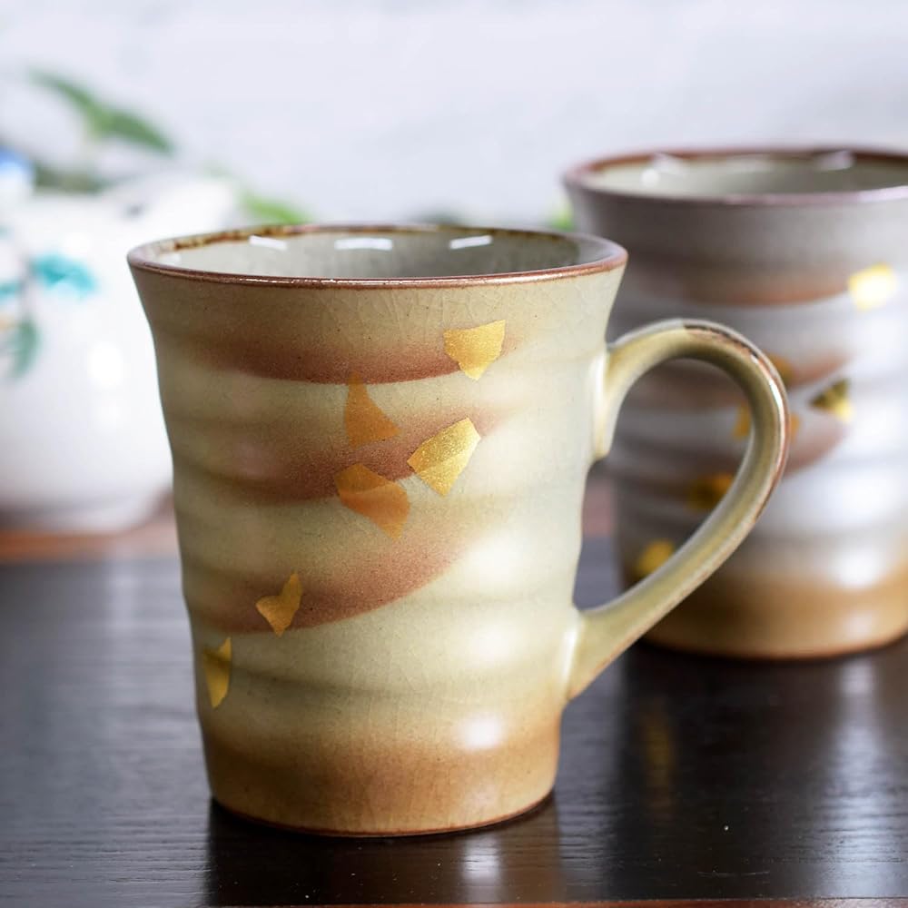 Kutani ware pottery pair mug gold and silver
