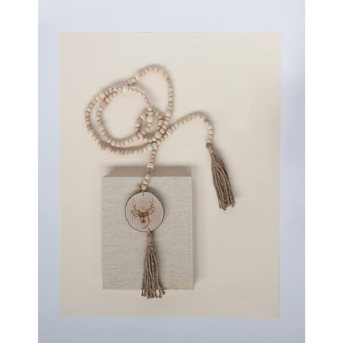 Paulownia wood beads garland deer icon tassel natural