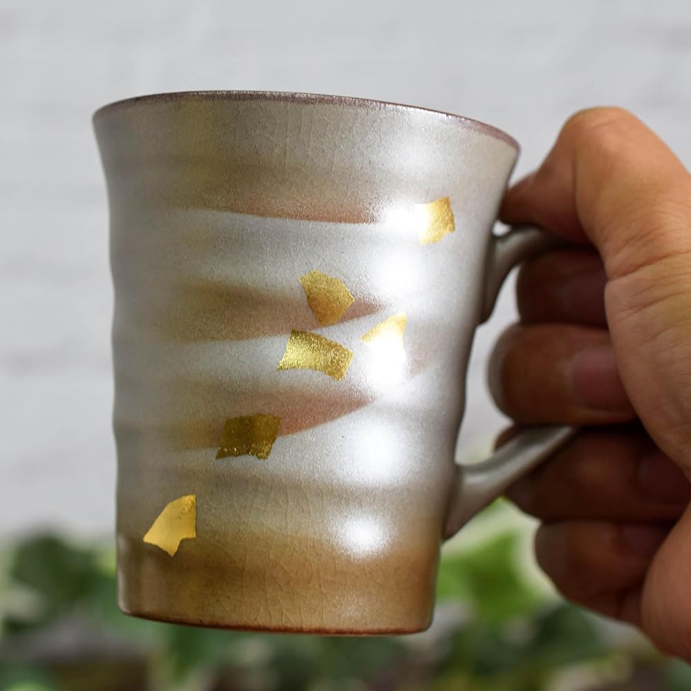 Kutani ware pottery pair mug gold and silver