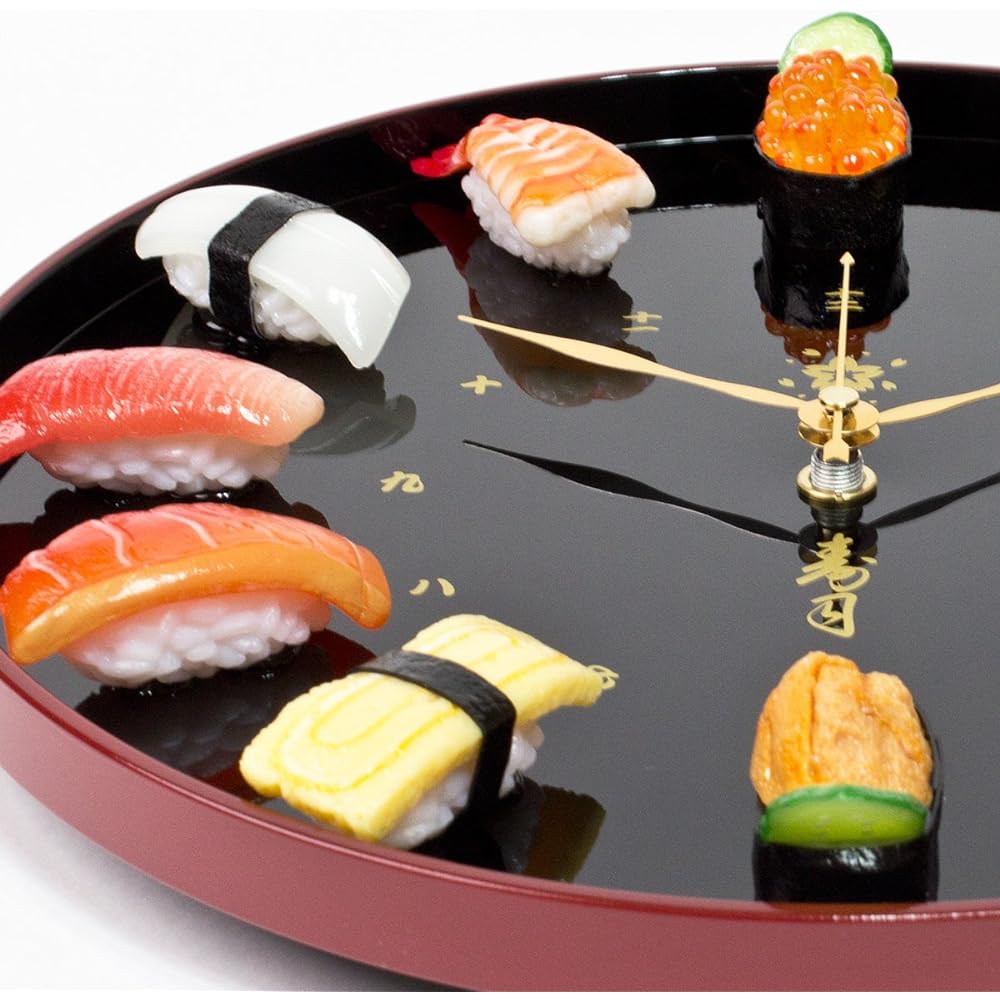 Real sushi clock that looks just like the real thing. Can be used as a wall clock or table clock. Made in Japan.