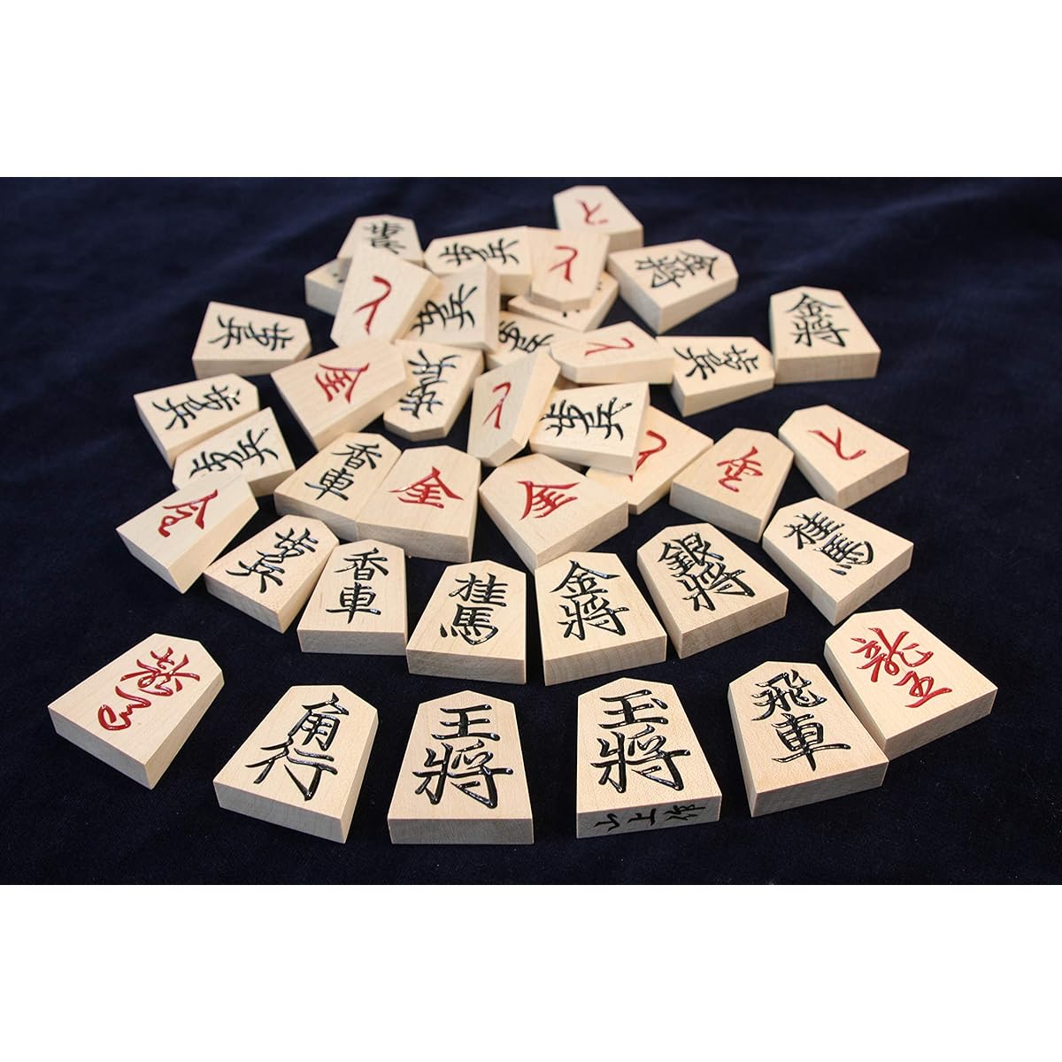 Set of shogi pieces by Yamagami, top carving, red back and 1 inch tabletop board