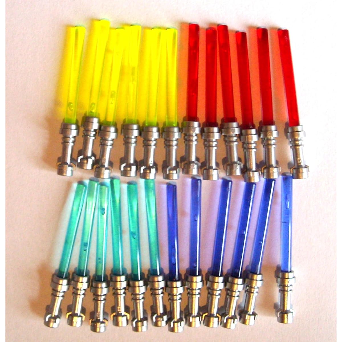 Lego Star Wars 24 Light sabers 6x yellow 6x red 6x blue 6x purple with flat silver hilts