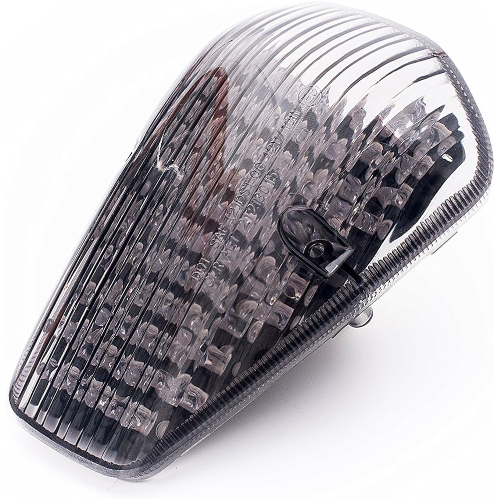 Motorcycle LED tail light. Includes flash brake for Honda with built-in turn signal. "Smoke lens" rating 4500 lumens or more. Honda VTX 1300/1800 Custom R