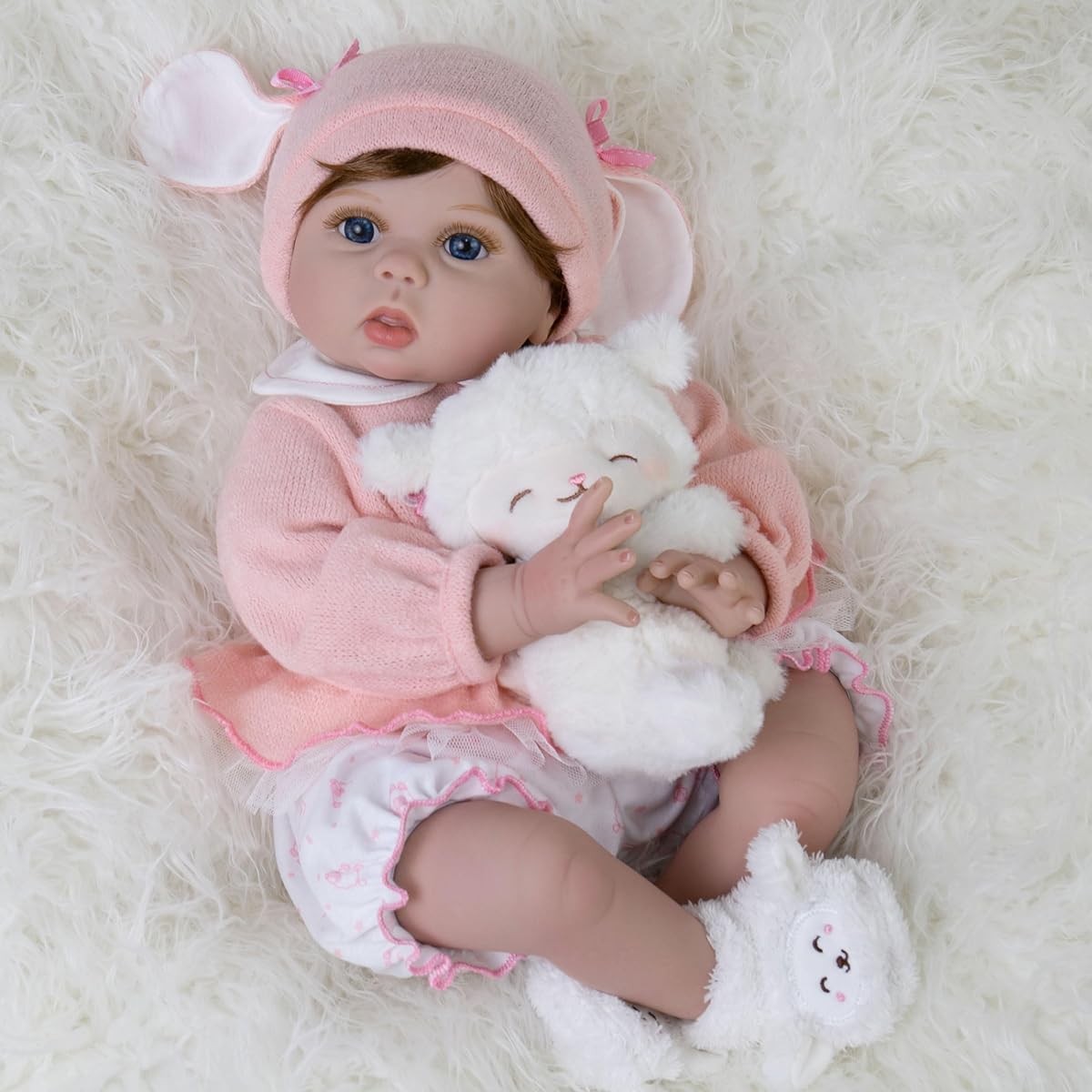 EKOKIZ Realistic Reborn Baby Doll Girl 22 Inch Newborn Doll with Hand-painted Details Cloth Body Baby Doll with Toy Accessories Gift Set Ages 3+ Cute Fake Baby Doll