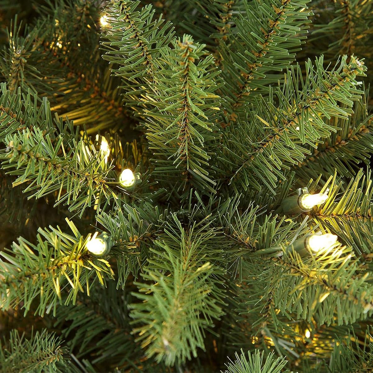 Puleo International 10' Pre-Light Fraser Fir Pencil Artificial Christmas Tree with 650 UL Certified Clear Lights