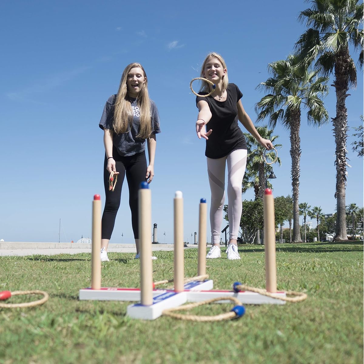 Deluxe Ring Toss Toy - Kids Wooden Outdoor Lawn or Beach Game and Fun Family, Friends or Office Activity - 1 Wood Base - 8 Rope Rings - 8 Plastic Rings - 1 Carry Bag for Travel or Storage