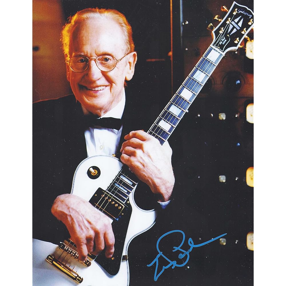 The late Les Paul autographed photo poster with PSADNA certificate of authenticity Gibson Les Paul creator guitar electric guitar history