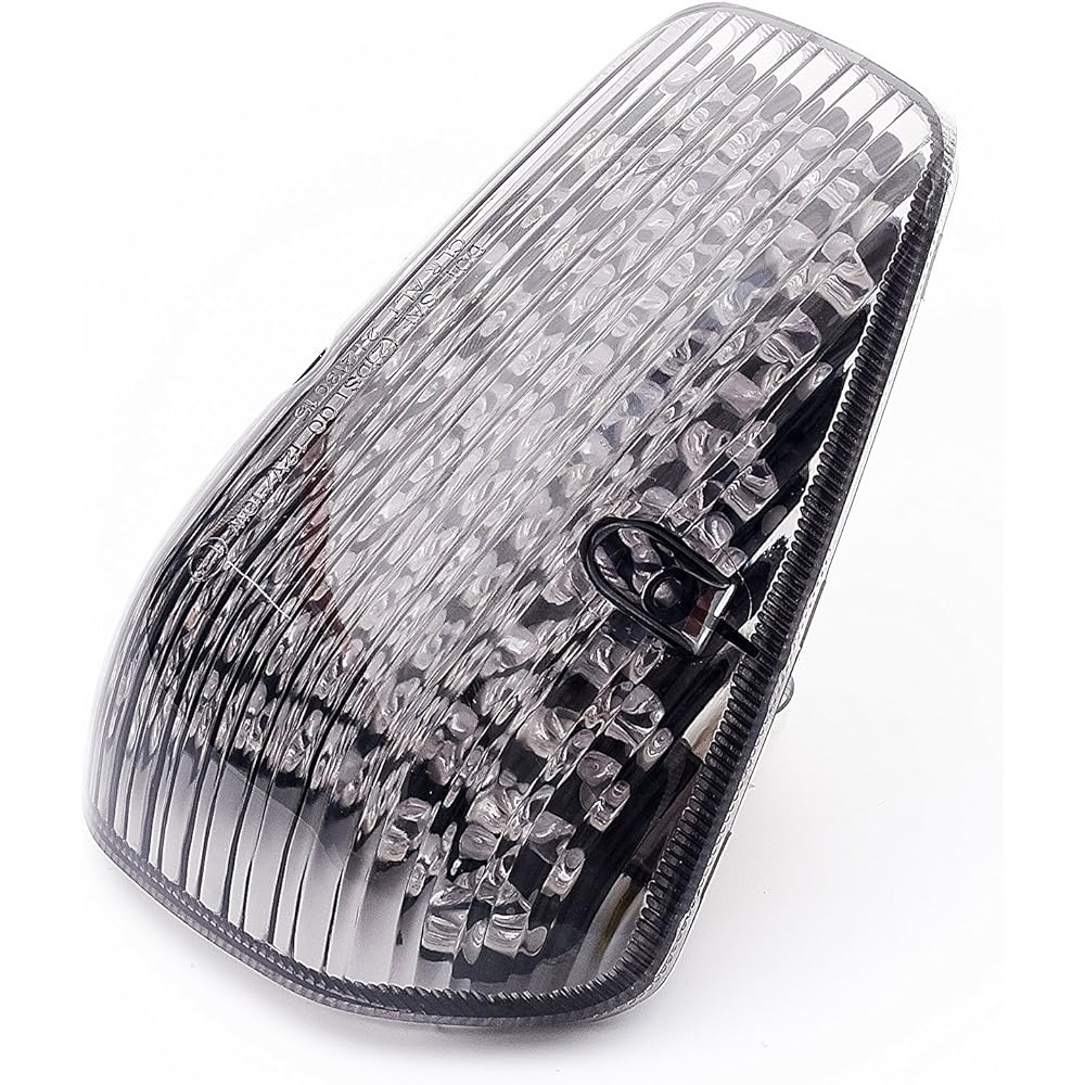 Motorcycle LED tail light. Includes flash brake for Honda with built-in turn signal. "Smoke lens" rating 4500 lumens or more. Honda VTX 1300/1800 Custom R