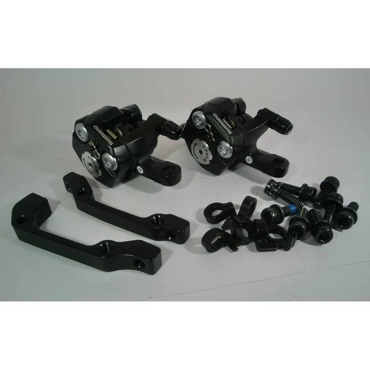 Shimano road bike mechanical disc brake BR-R317 black front and rear set IS mount adapter included 963