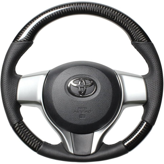 REAL Steering [Vitz (130 series)/Ractis (120 series)] Black Carbon P130-BKC-BK-VIT