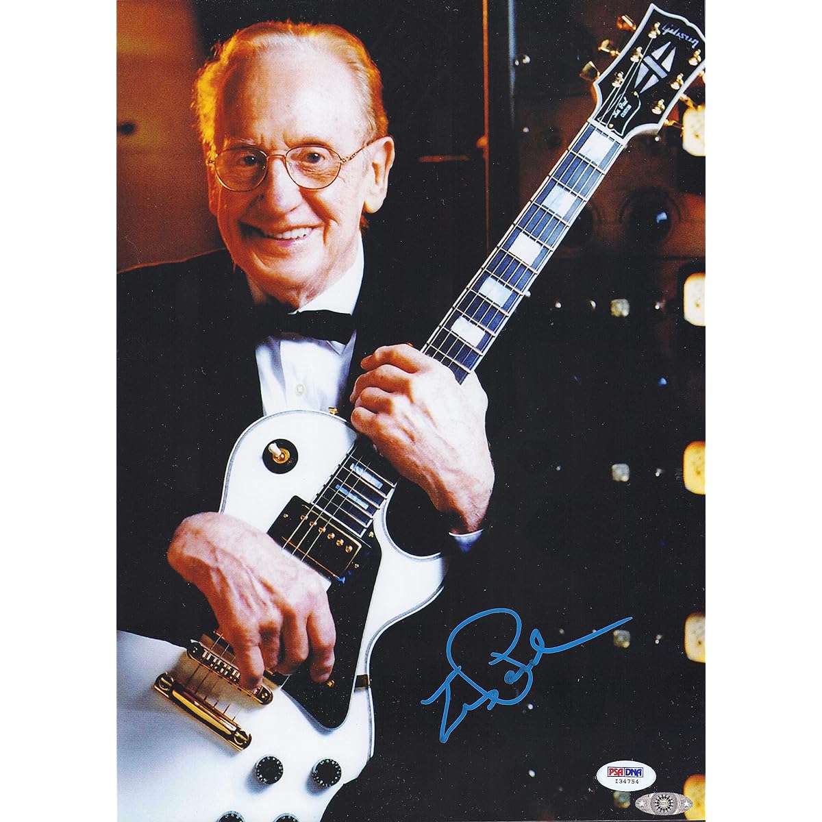 The late Les Paul autographed photo poster with PSADNA certificate of authenticity Gibson Les Paul creator guitar electric guitar history